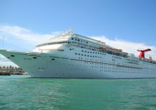 KEY WEST, FLORIDA - JUNE 1, 2016: Carnival Fantasy Cruise Ship anchors at the Port of Key West. Carnival Fantasy is the lead ship of the Fantasy-class of cruise ships operated by Carnival Cruise Line